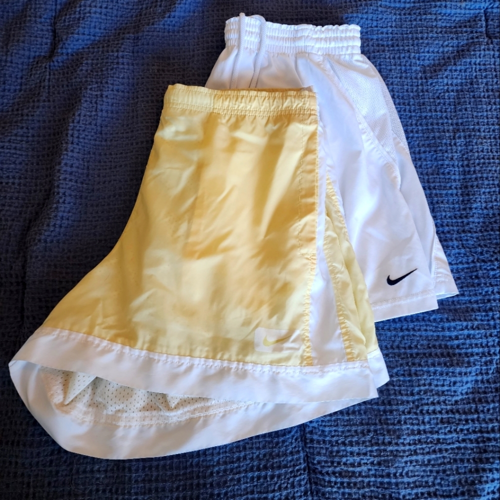 Two pairs of women's Nike running shorts